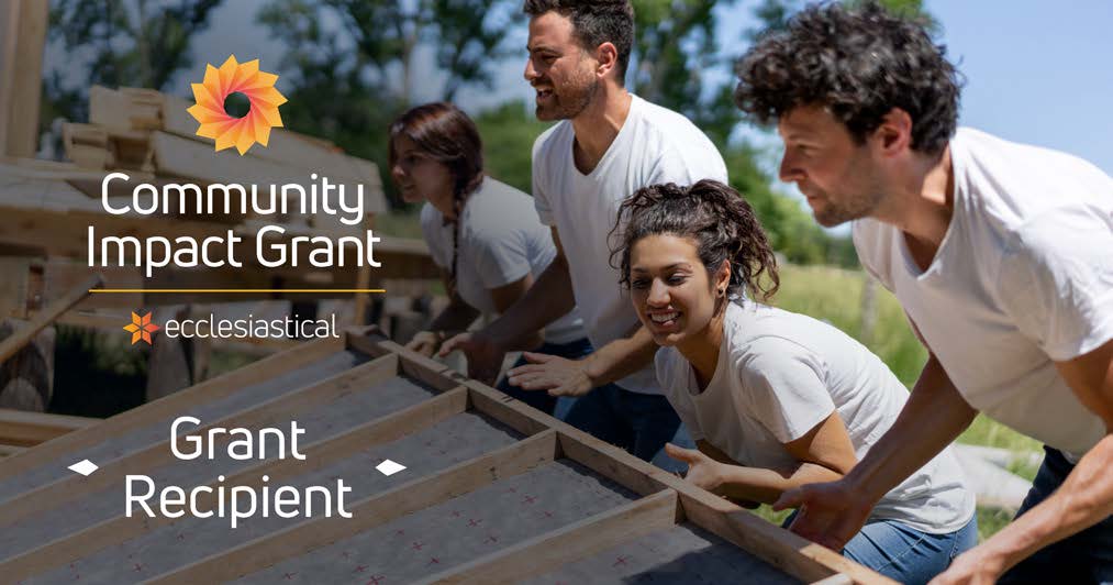 Community Impact Grant ecclesiastical Grant Recipient photo. Background behind text shows volunteers lifting a wall of a building.